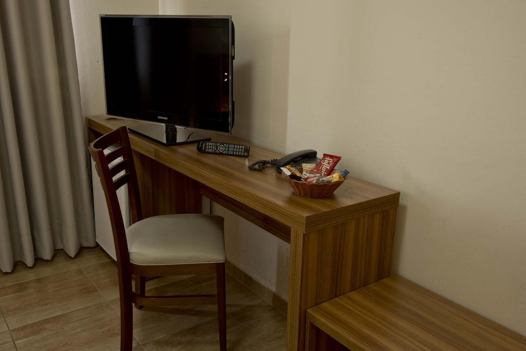 Grand Enio Hotel E Cantina Varginha  Rom bilde